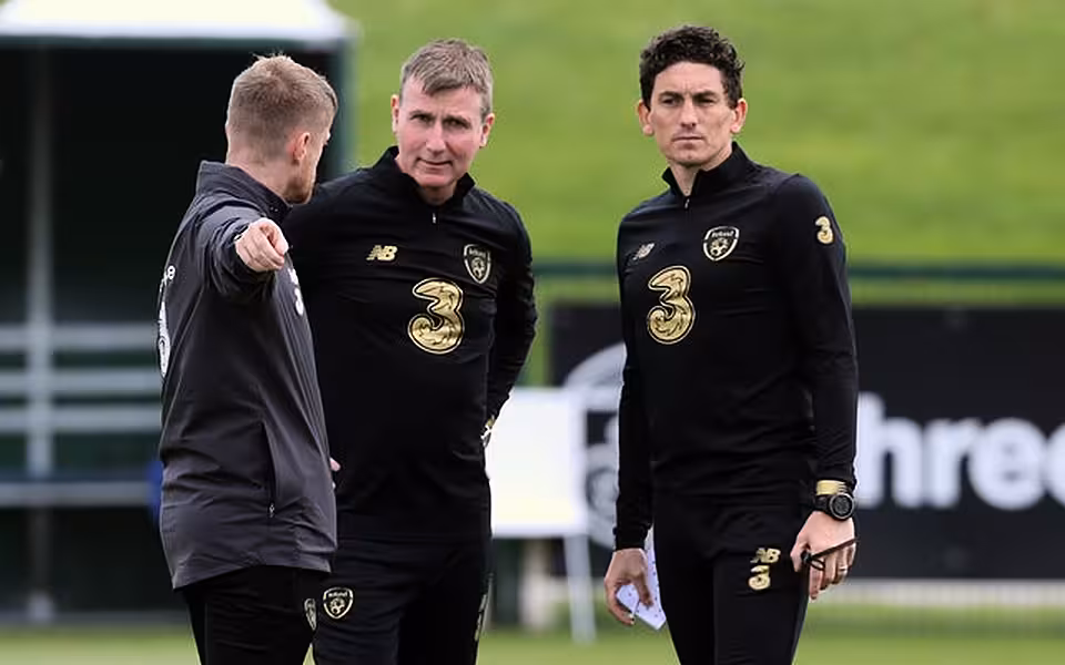 Republic of Ireland coach Damien Duff (left), manager Stephen Kenny (centre) and coach Keith Andrews prepare their players for the clash with Finland (Niall Carson/PA)