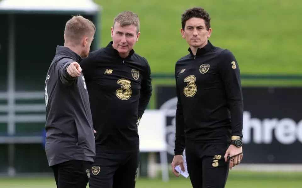 Republic of Ireland coach Damien Duff (left), manager Stephen Kenny (centre) and coach Keith Andrews prepare their players for the clash with Finland (Niall Carson/PA)