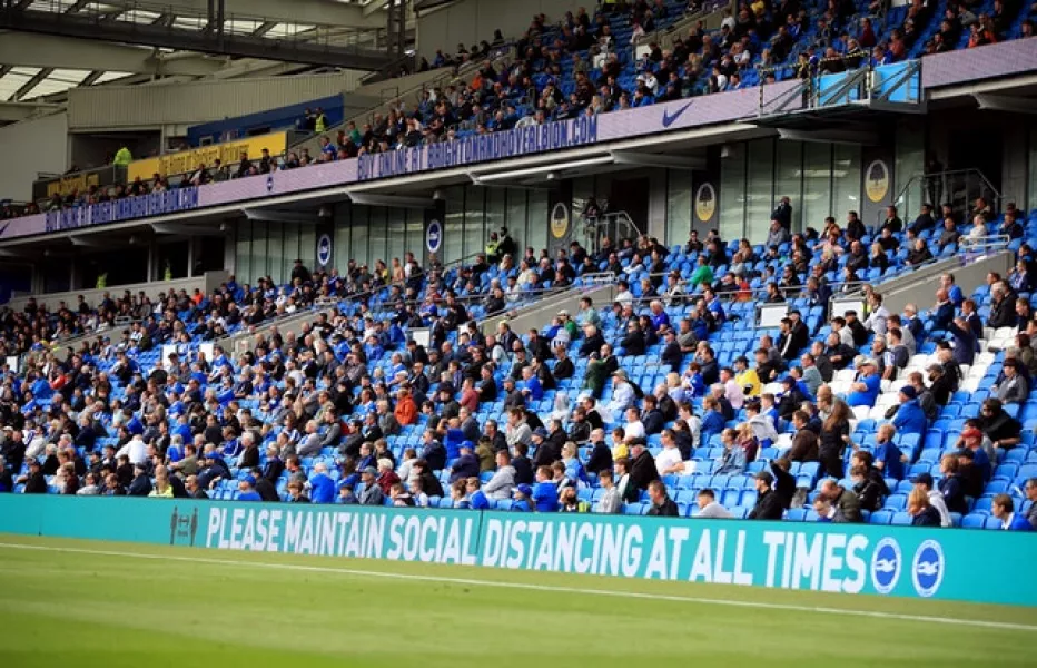 Brighton fans adhere to social distancing in the friendly against Chelsea (Adam Davy/PA)