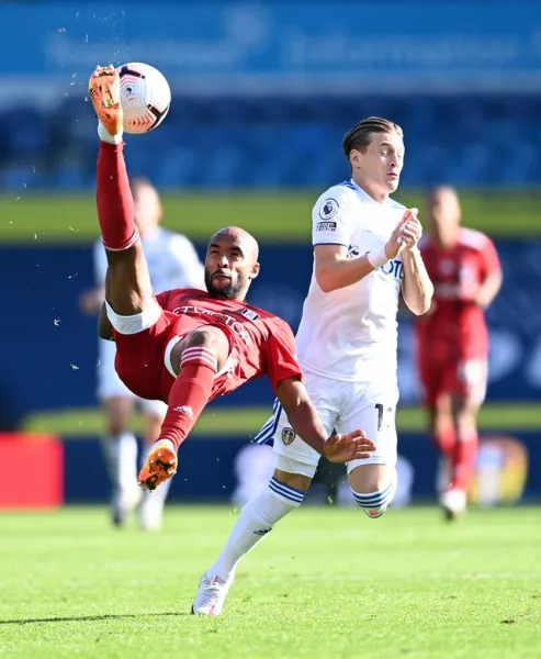 Fulham’s Denis Odoi pulls off an overhead kick at Elland Road (Laurence Griffiths/PA)