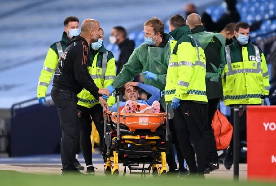Guardiola (left) showed concern for the injured Adrian Bernabe (Laurence Griffiths/PA)