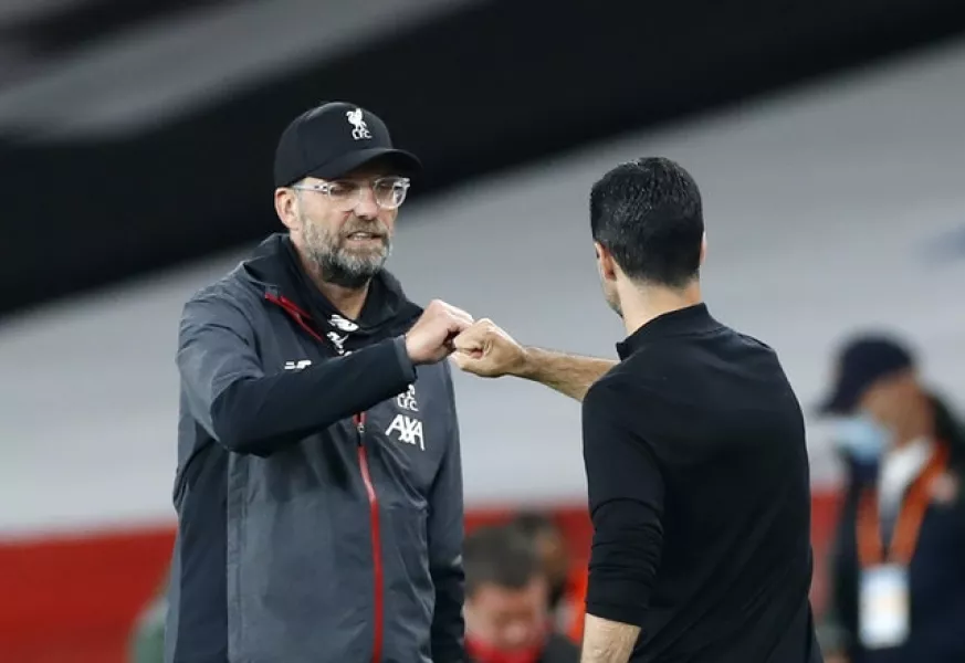 Liverpool manager Jurgen Klopp (left) is preparing to face Arsenal manager Mikel Arteta (Paul Childs/PA)