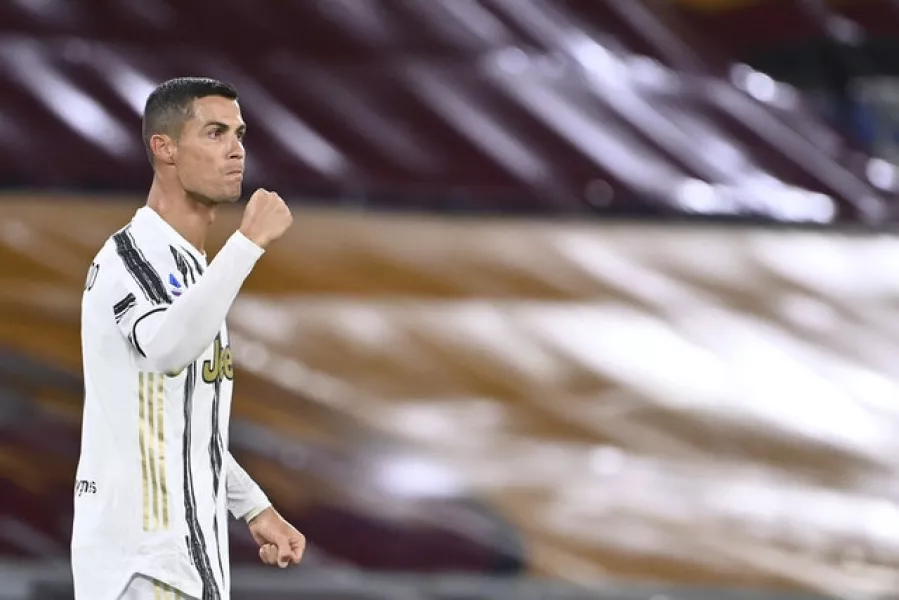 Cristiano Ronaldo scored both goals in Juventus’ 2-2 draw at Roma (Alfredo Falcone/AP)