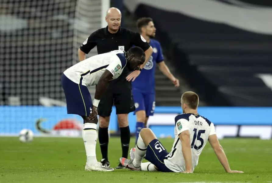 The workload takes its toll on Eric Dier, right (Matt Dunham/PA)
