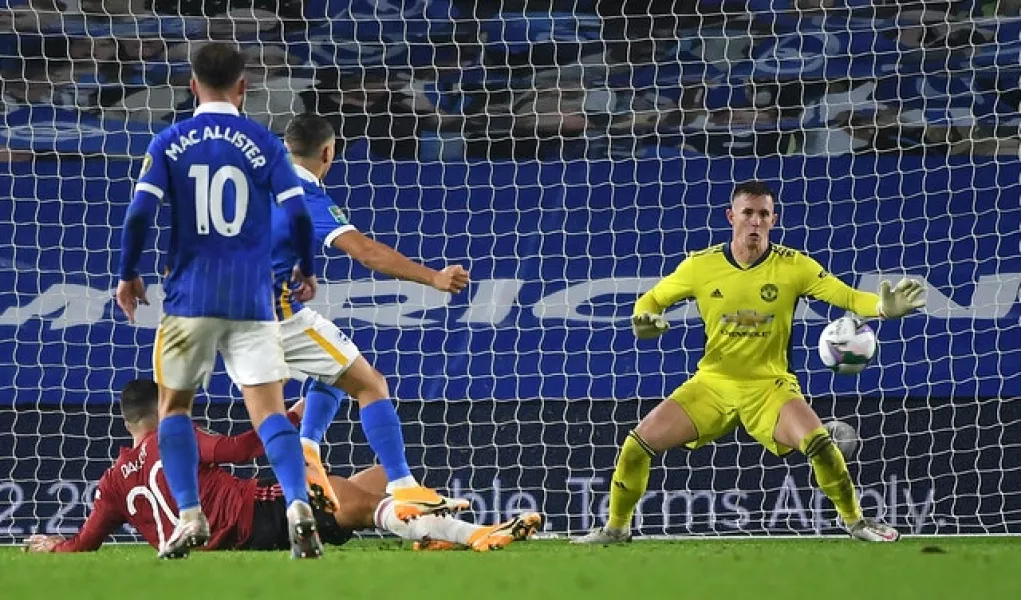 Dean Henderson made a fine save to deny Leandro Trossard (Andy Rain/PA)