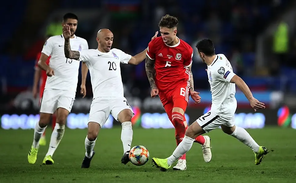 Joe Rodon, centre, has won four caps for Wales (Nick Potts/PA)