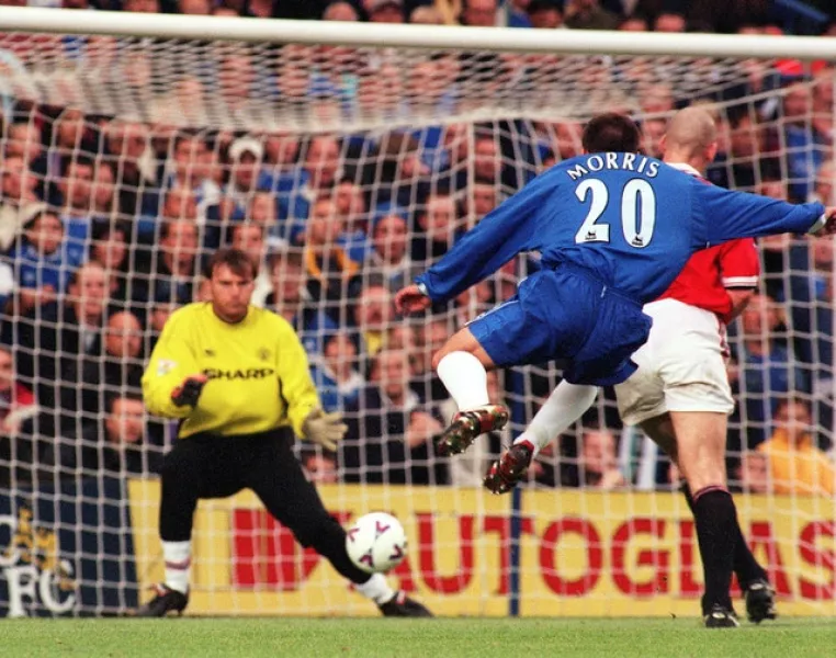Chelsea’s Jody Morris scores his side’s fifth goal against Manchester United at Stamford Bridge in October 1999 (Martyn Hayhow/PA)
