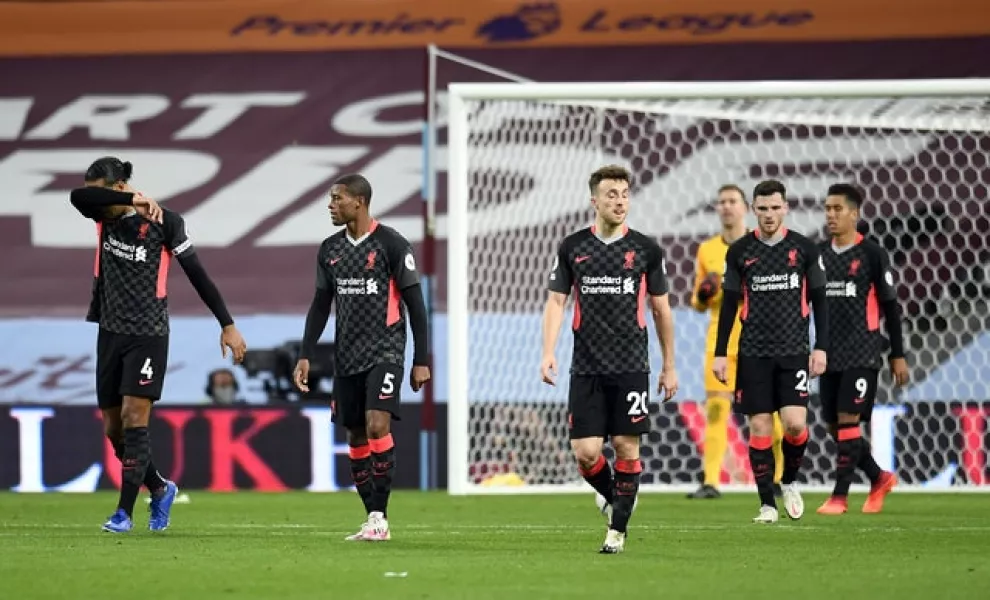 Liverpool’s players appear dejected as they are hammered by Aston Villa (Peter Powell/PA)