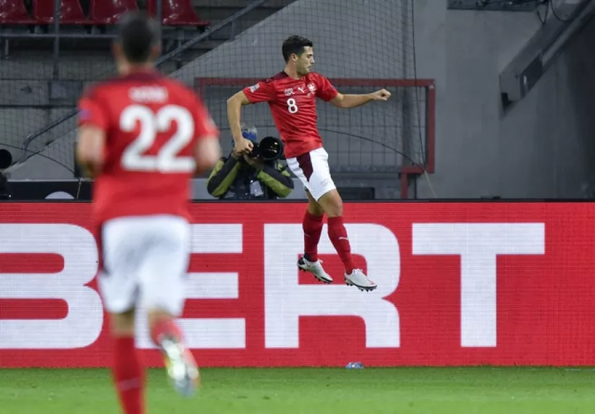 Remo Freuler celebrates his goal against Germany (Martin Meissner/AP)