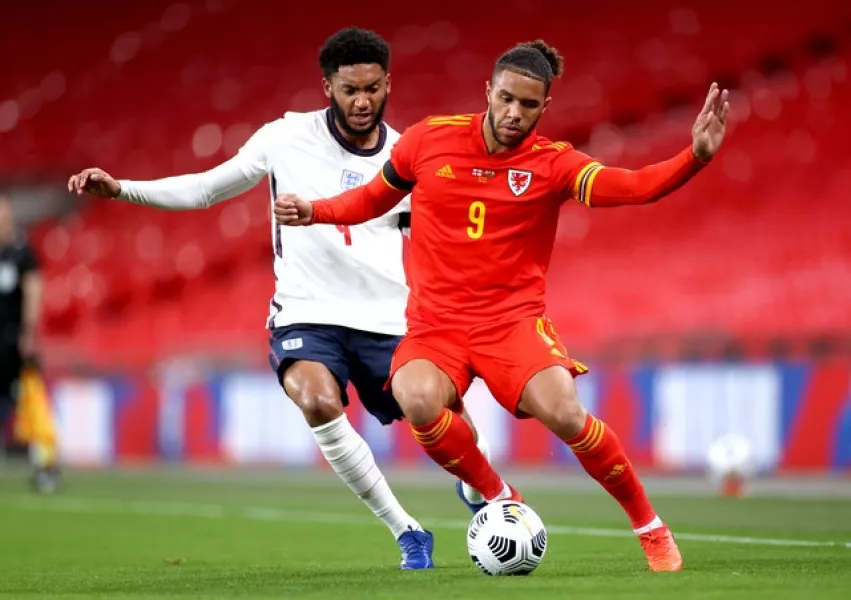 Leeds striker Tyler Roberts (right) could fill the forward gap for Wales in Bulgaria on Wednesday (Carl Recine/PA)