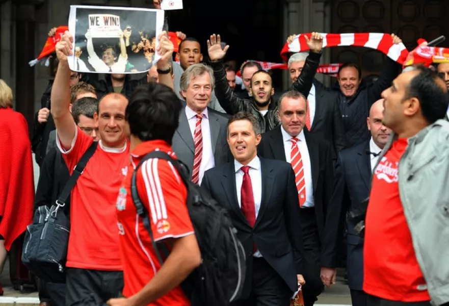 Martin Broughton, centre, managing director Christian Purslow, front centre, and Ian Ayre, right, pushed through the sale of Liverpool in 2010 after a High Court battle (Fiona Hanson/PA)
