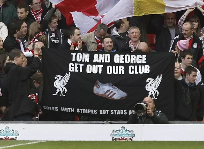 Protests were organised inside Anfield (Peter Byrne/PA)