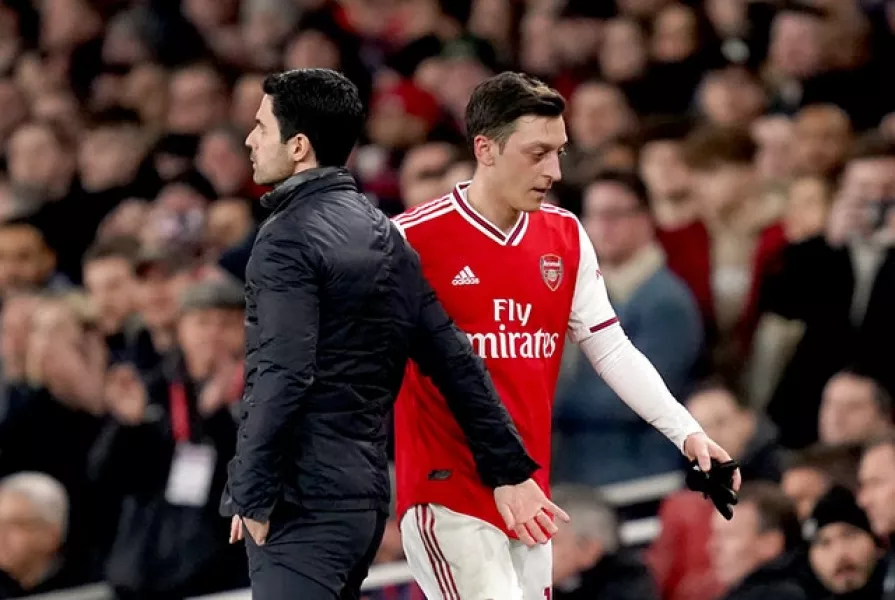 Ozil has not been selected by Arteta since March 7. (John Walton/PA)