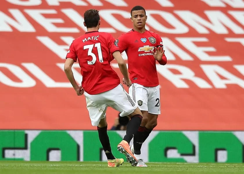 Manchester United’s Mason Greenwood, right, got the equaliser (PA)