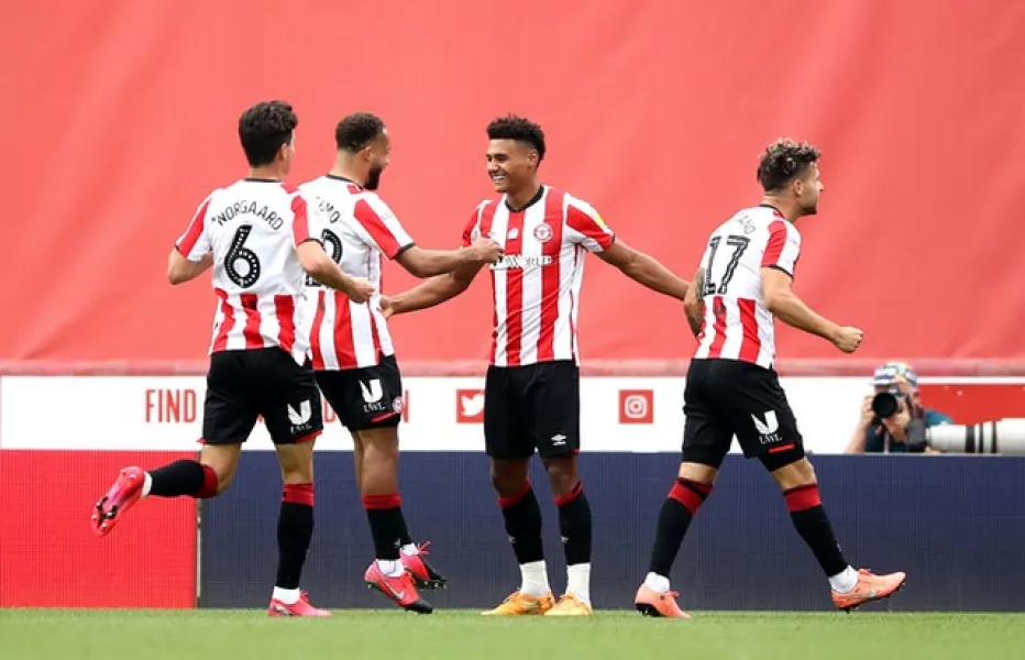 Brentford’s Ollie Watkins, second right, has scored 25 league goals this season (Tim Goode/PA)