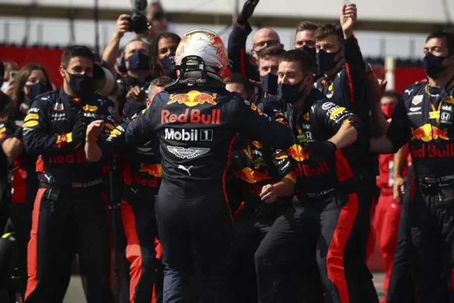 Max Verstappen celebrates with his Red Bull team (Bryn Lennon/AP).