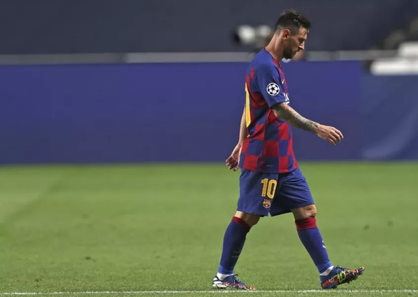 Lionel Messi leaves trudges off the pitch at half-time against Bayern Munich. Photo: Rafael Marchante/AP