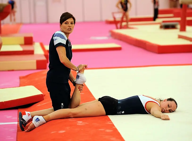 Amanda Reddin, left, pictured with former Olympic gymnast Beth Tweddle in 2012 (Tony Marshall/PA)