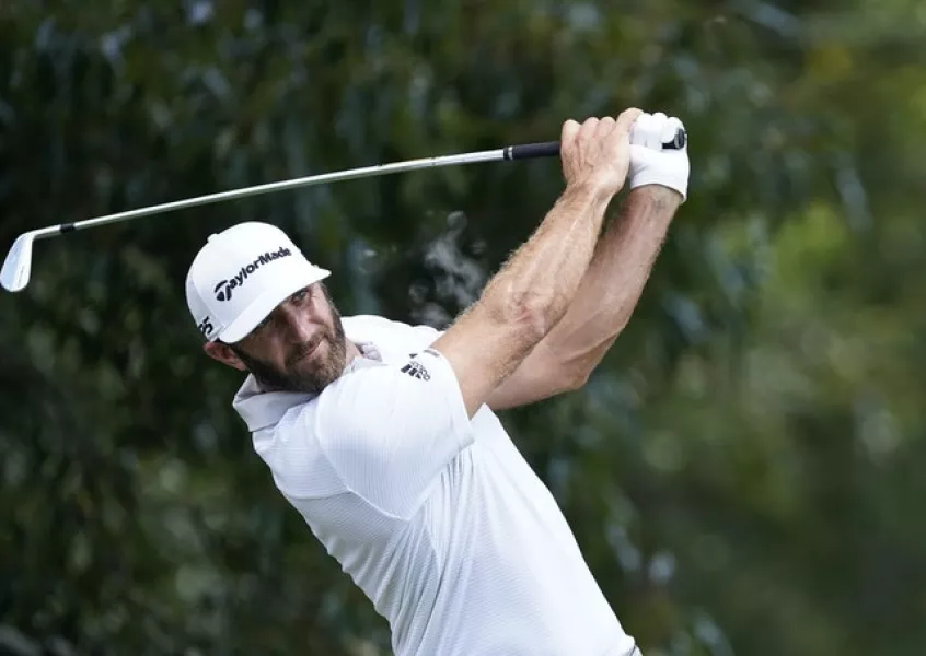 World number one Dustin Johnson kept himself in contention after a difficult round in Atlanta (John Bazemore/AP)