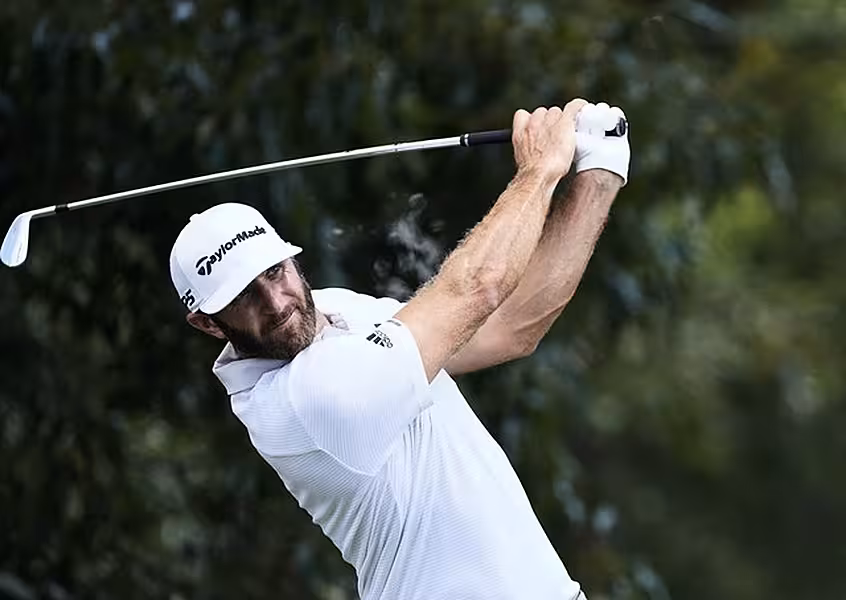 World number one Dustin Johnson kept himself in contention after a difficult round in Atlanta (John Bazemore/AP)
