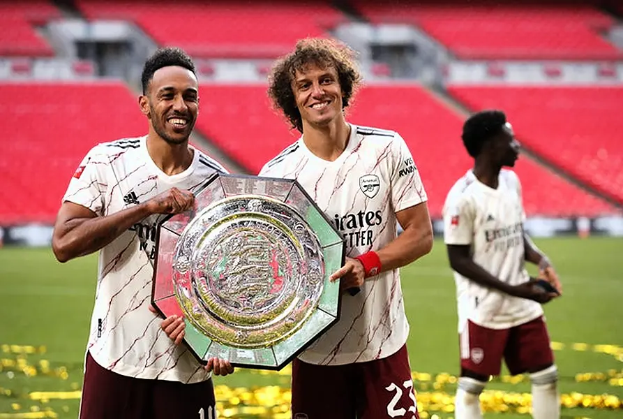 David Luiz, right, has helped Arsenal to silverware (Andrew Couldridge/PA)