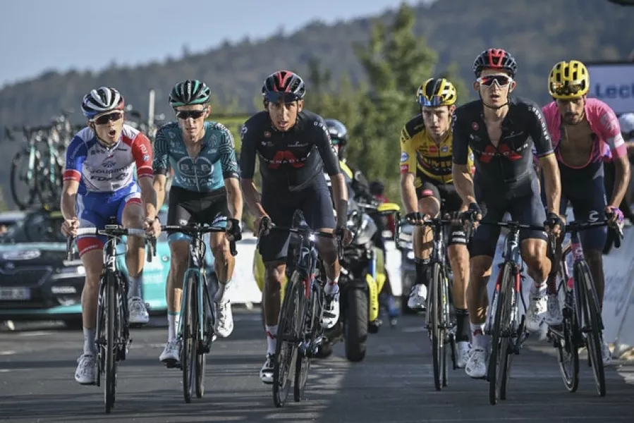 Egan Bernal, centre, crossed the line more than seven minutes after his rivals (Anne-Christine Poujoulat/AP/PA)