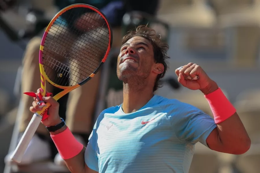 Rafael Nadal punches the air after beating Sebastian Korda (Michel Euler/AP)