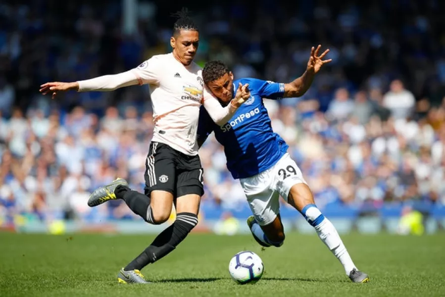 Manchester United’s Chris Smalling (left) could move to Roma permanently (Matin Rickett/PA)