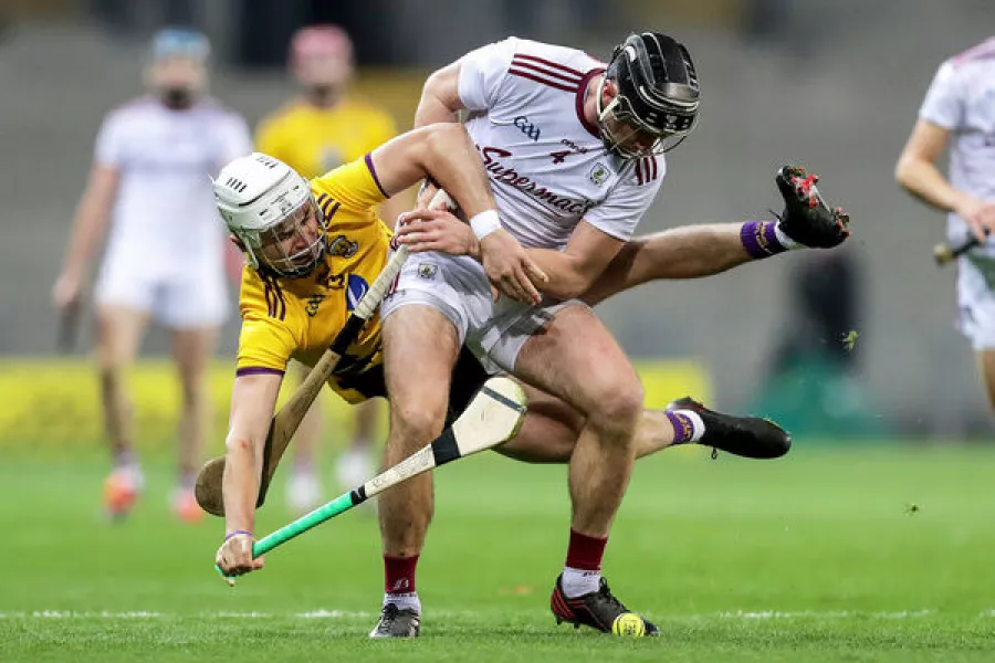 Wexford's Rory O'Connor and Aidan Harte of Galway. Picture: INPHO/Laszlo Geczo