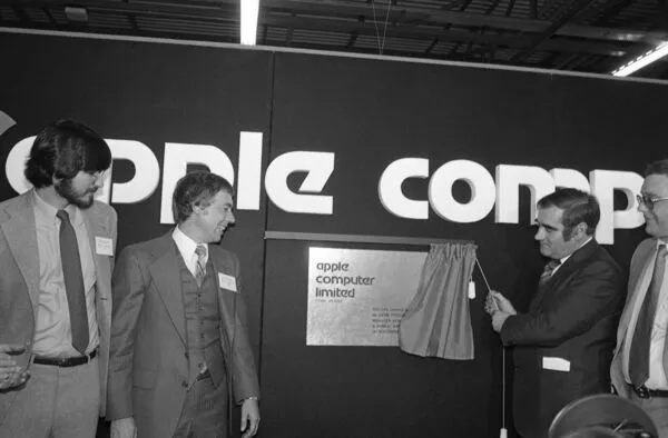 Gene Fitzgerald TD unveiling a plaque to officially open the new Apple Computer plant at Hollyhill in November 1980. Included in the picture is Steve Jobs, vice-chairman Apple, Mike Markkula, chairman, and Alec Wrafter, managing director Apple. Picture: Irish Examiner