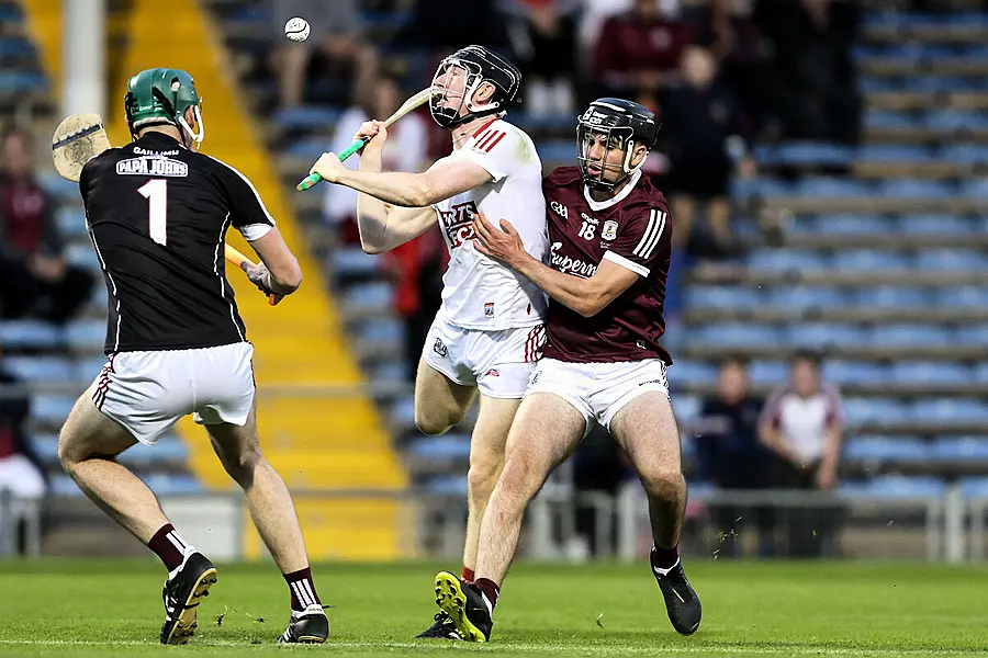 Cork's Jack Cahalane with Galway goalkeeper Paddy Rabbitte and Shane Morgan. Picture: INPHO/Laszlo Geczo