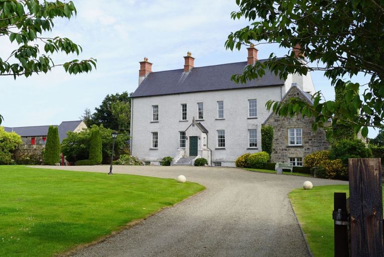 Woodfield House, a Queen Anne manor built in 1710 on the shores of Doon Lake, Co Clare. 
