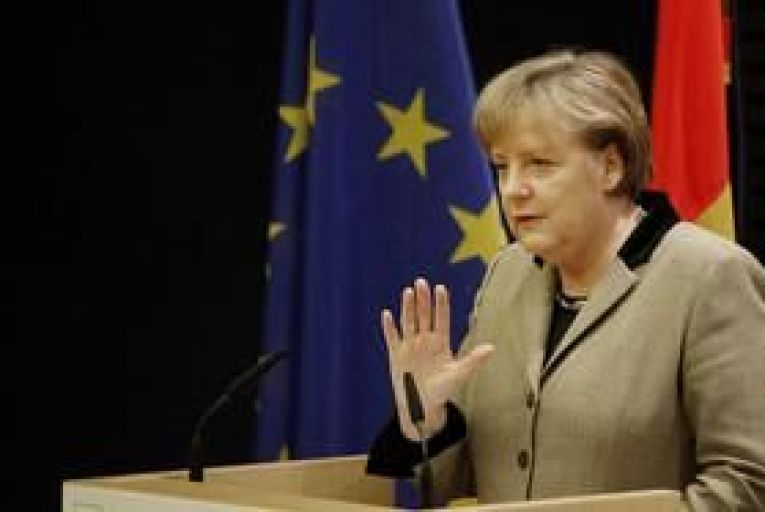 Merkel urges more focus on jobs, competitiveness