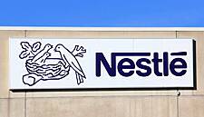 Nestlé Cuts 2015 Forecast as Nine-Month Sales Miss Estimates