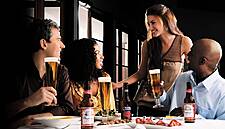 AB InBev Raises Sales Outlook on Growth in Premium Beer Brands