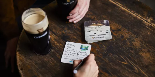 Guinness Transforms Beermats Into Postcards For Charity
