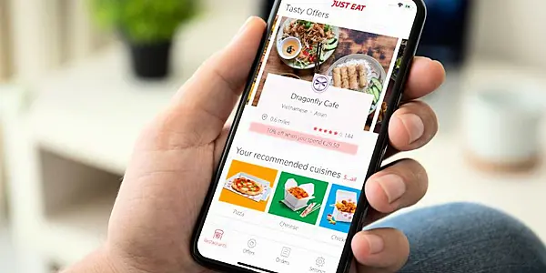 Just Eat Takeaway Swings To Small 2022 Core Profit, Sees Better 2023