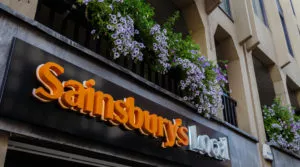 The Sainsbury's Local logo on a sign above their store in the centre of Chester