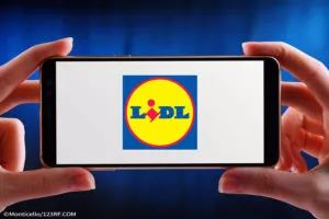 Hand held smart phone with LIDL logo on the screen