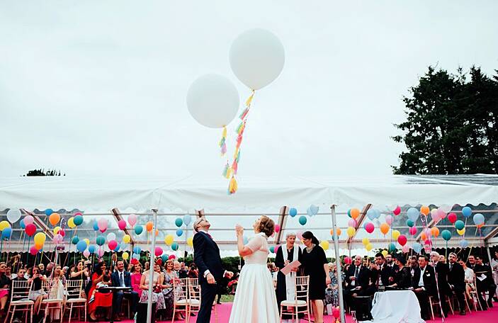Alison and Garret's fun balloon extravaganza marquee wedding