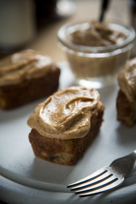 Banana Bread with Almond Butter & Chocolate Chips | DonalSkehan.com, Mini loaves topped with a creamy nut butter frosting!