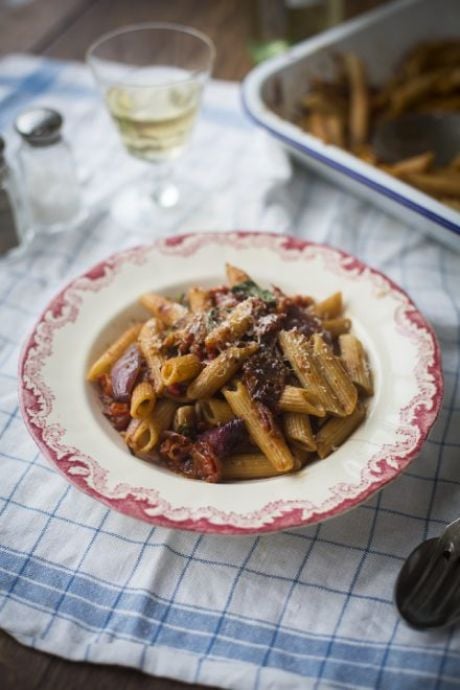 One Pan Mushy Tomato & Garlic Penne Pasta | DonalSkehan.com, Roasting this sauce in the oven, instead of simmering it on the hob, makes this dinner a great fuss-free option.