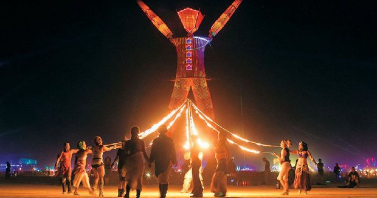 A man has died at the Burning Man festival after jumping into burning