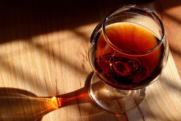 French Cognac Makers 'Deeply Concerned' After EU Slaps Tariffs On Chinese EVs