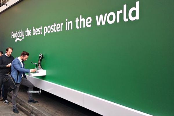 Carlsberg Billboard Dispenses Beer to Passers-By