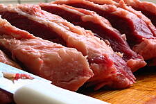 KKR-Backed Cofco Meat Falls 24 Percent In Hong Kong Debut