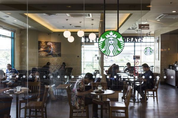 Starbucks' Departing Chairman Backs China Prospects, Hints At Alibaba Tie-Up