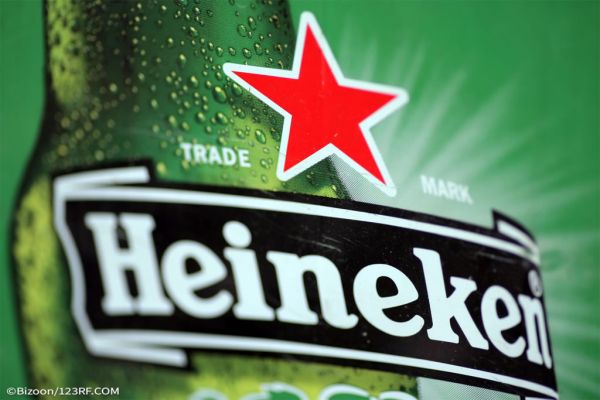 Heineken Posts Strong First Half, Drops 2023 Margin Target