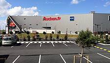 French Supermarket Sell-Off Continues: Auchan To Offload 21 Sites