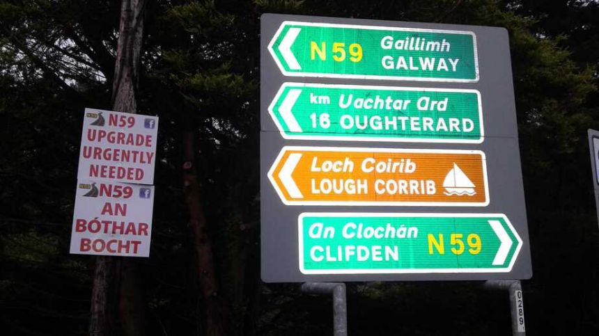 Posters appear along N59 highlighting poor condition of road